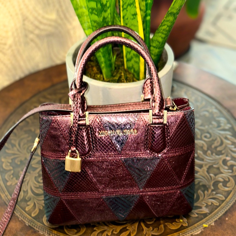 Michael Kors bag new without tags. Stunning maroon metallic color handbag